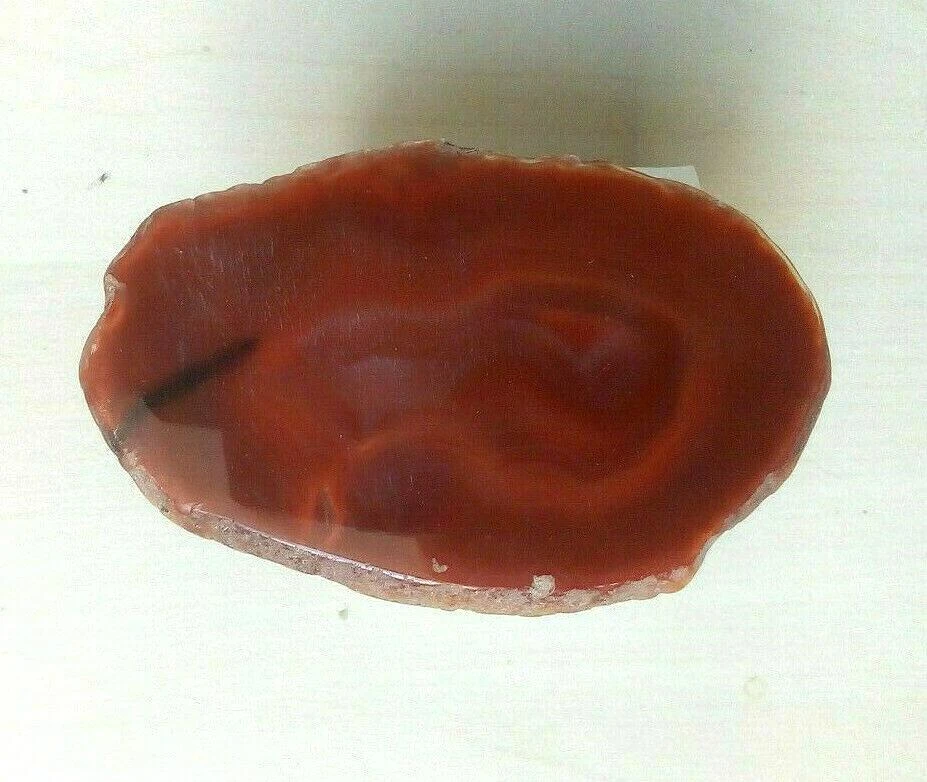 Petite agate orange en tranche fine polie long 9,2 cm haut 5,8 cm / 54,69 g